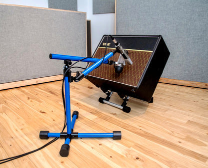 Base 4 Stands Shorty mic stand on an amplifier